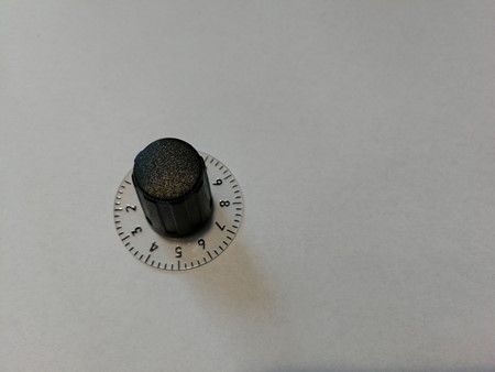 Justeringsknapp med skala for sengetimer